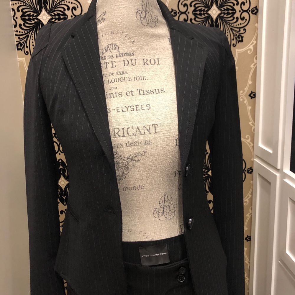 Italian Black jacket with white stripes.